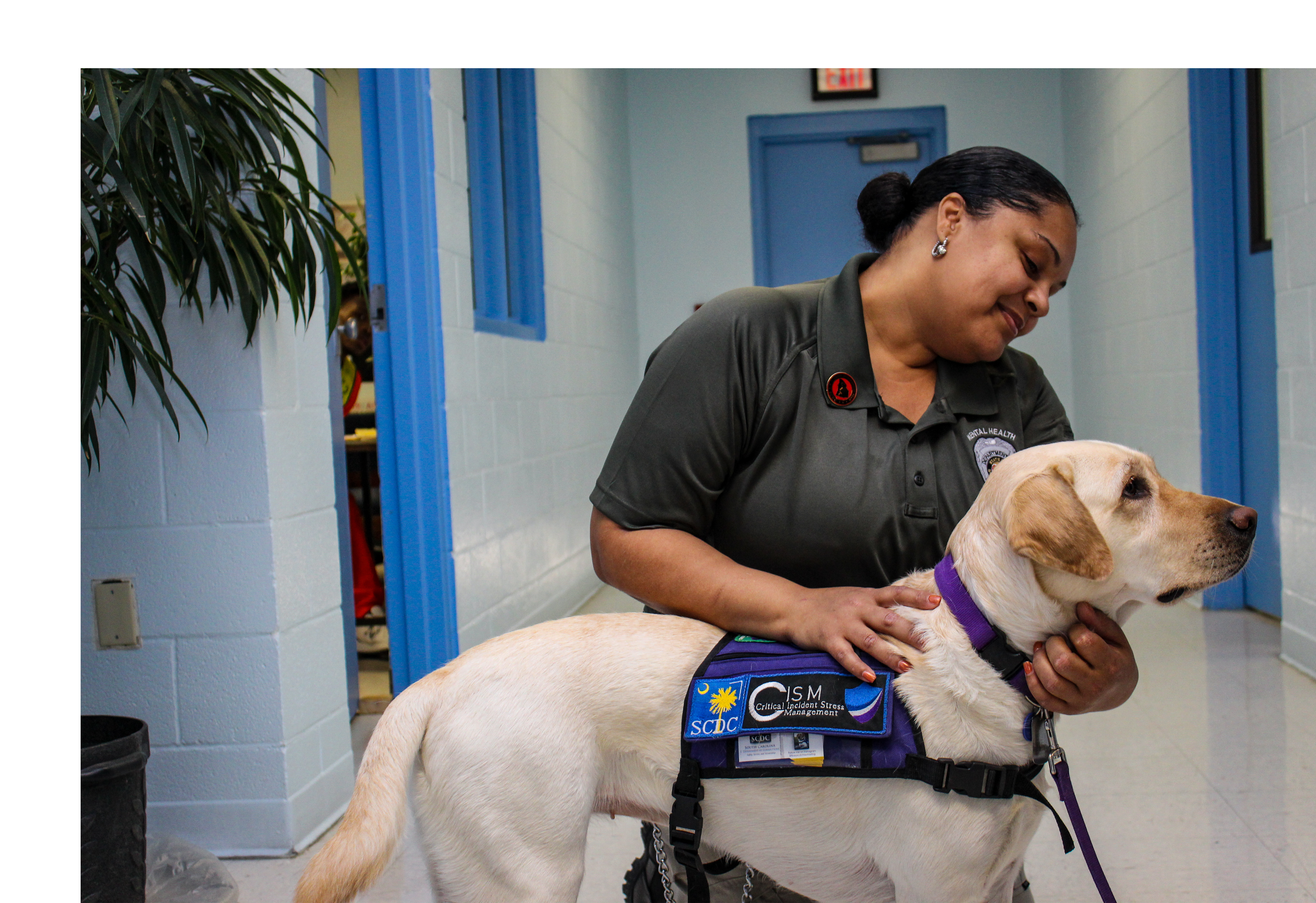 Correctional Officer petting Flossy